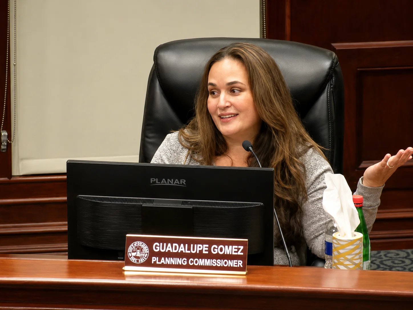 Commissioner Lupe Gomez serving at the planning commission dais